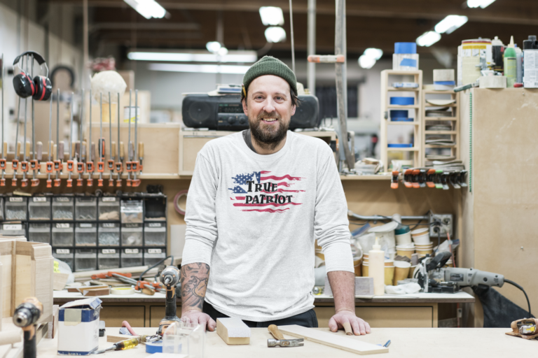 long-sleeve-tee-mockup-of-a-bearded-man-in-a-workshop-43064-r-el2
