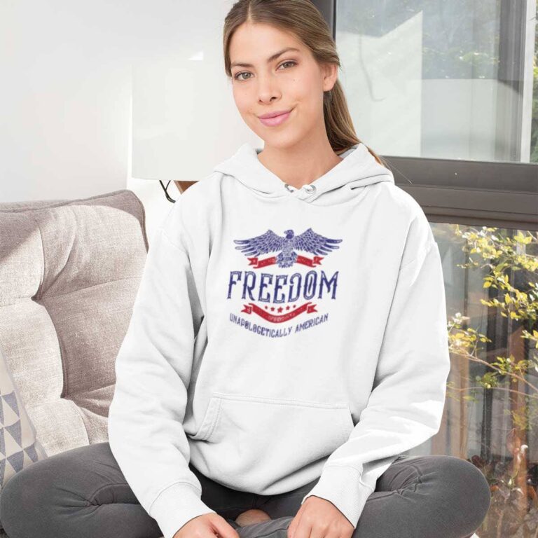 sublimated-pullover-hoodie-mockup-featuring-a-young-woman-sitting-on-a-fabric-couch-31248